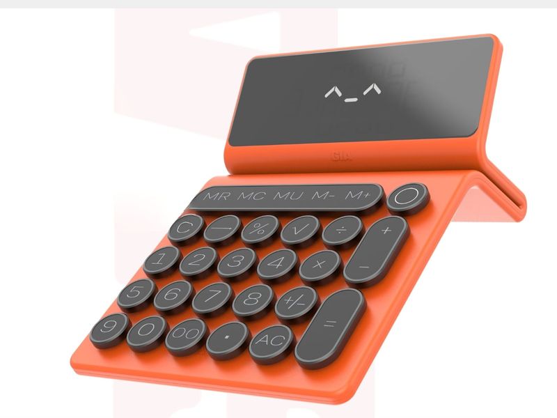 A Typewriter-Inspired Calculator in Vibrant Coral Red Just Stole Our Heart