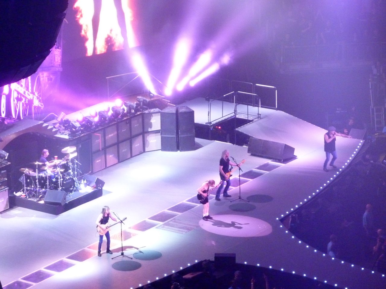 AC/DC on stage at the O2 in London under purple lights