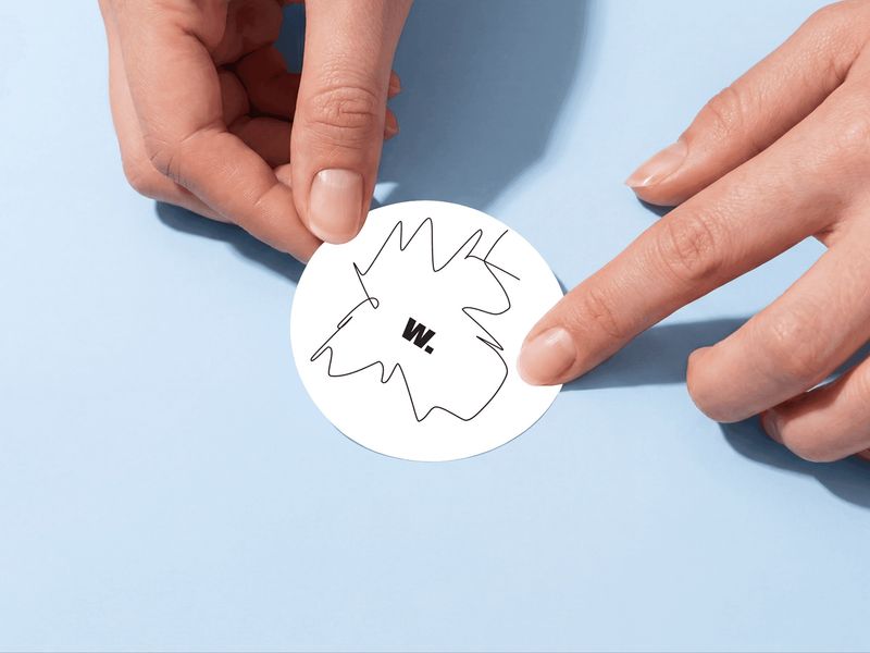 Round Sticker Mockup Applied by Hand